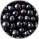 Nahaufnahme von mehreren Cassis als Darstellung für das Aroma nach schwarzer Johannisbeere