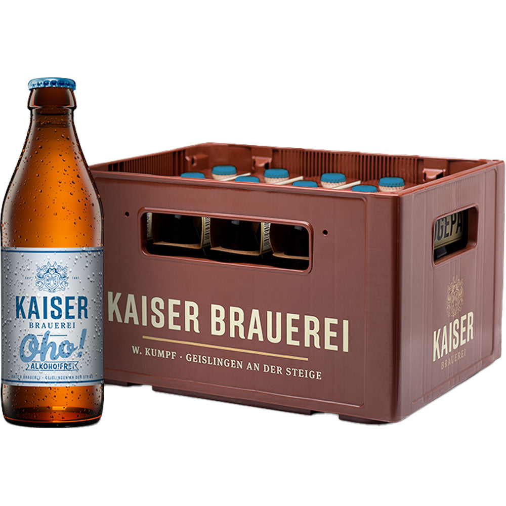 Eine braune Kiste der Kaiser Brauerei enthält Bierflaschen, daneben steht eine Flasche Kaiser Oho Alkoholfrei 20x 0,33 Liter (MEHRWEG).