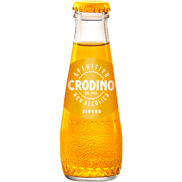 A 0,1-Liter Glasflasche Crodino Aperitiv alkoholfrei von Crodino mit gelb-oranger Flüssigkeit und passendem Deckel - ein Klassiker der italienischen Aperitivo-Kultur.
