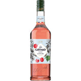 Der Giffard Litschi Sirup Litschi 1 Liter von Giffard hat eine rosafarbene Flüssigkeit und ein Etikett mit Litschi-Fruchtabbildungen, ideal für die Zubereitung erfrischender Litschi-Cocktails.
