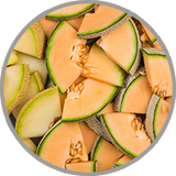 Nahaufnahme von aufgeschnittenen Honigmelonen zur Visualisierung der saftigen, süßlichen Fruchtaromatik in Weißweinen